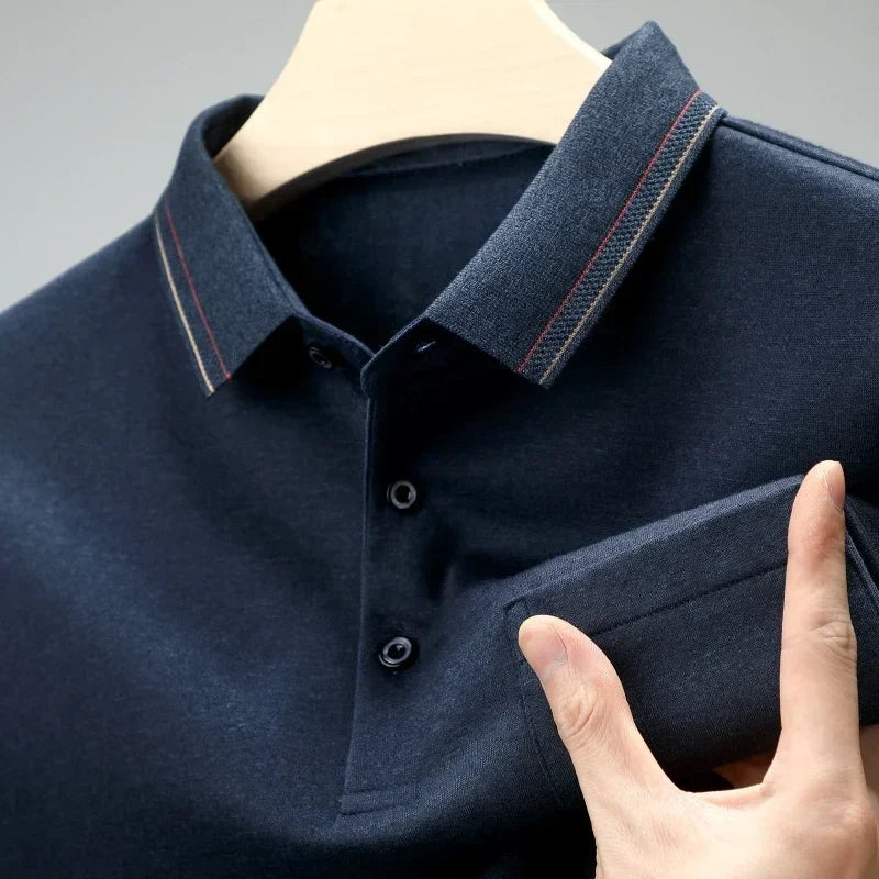 Abisso premium navy blue polo shirt with subtle red trim on the collar