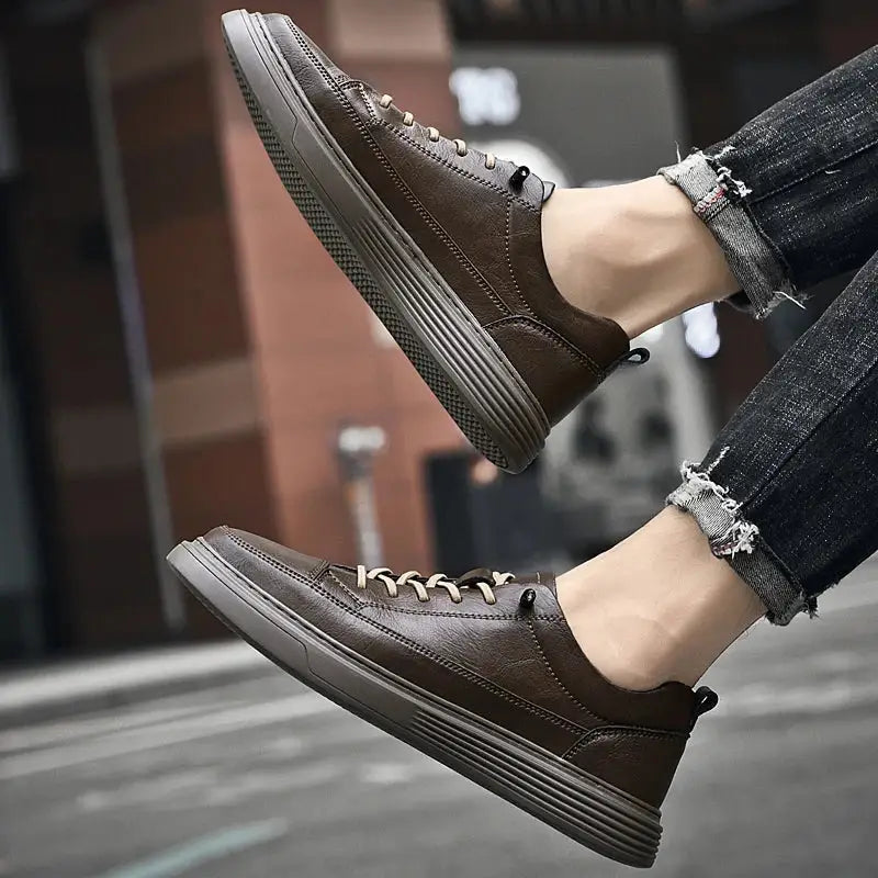 Brown leather sneakers with white laces and thick soles from Sarvo erkek günlük