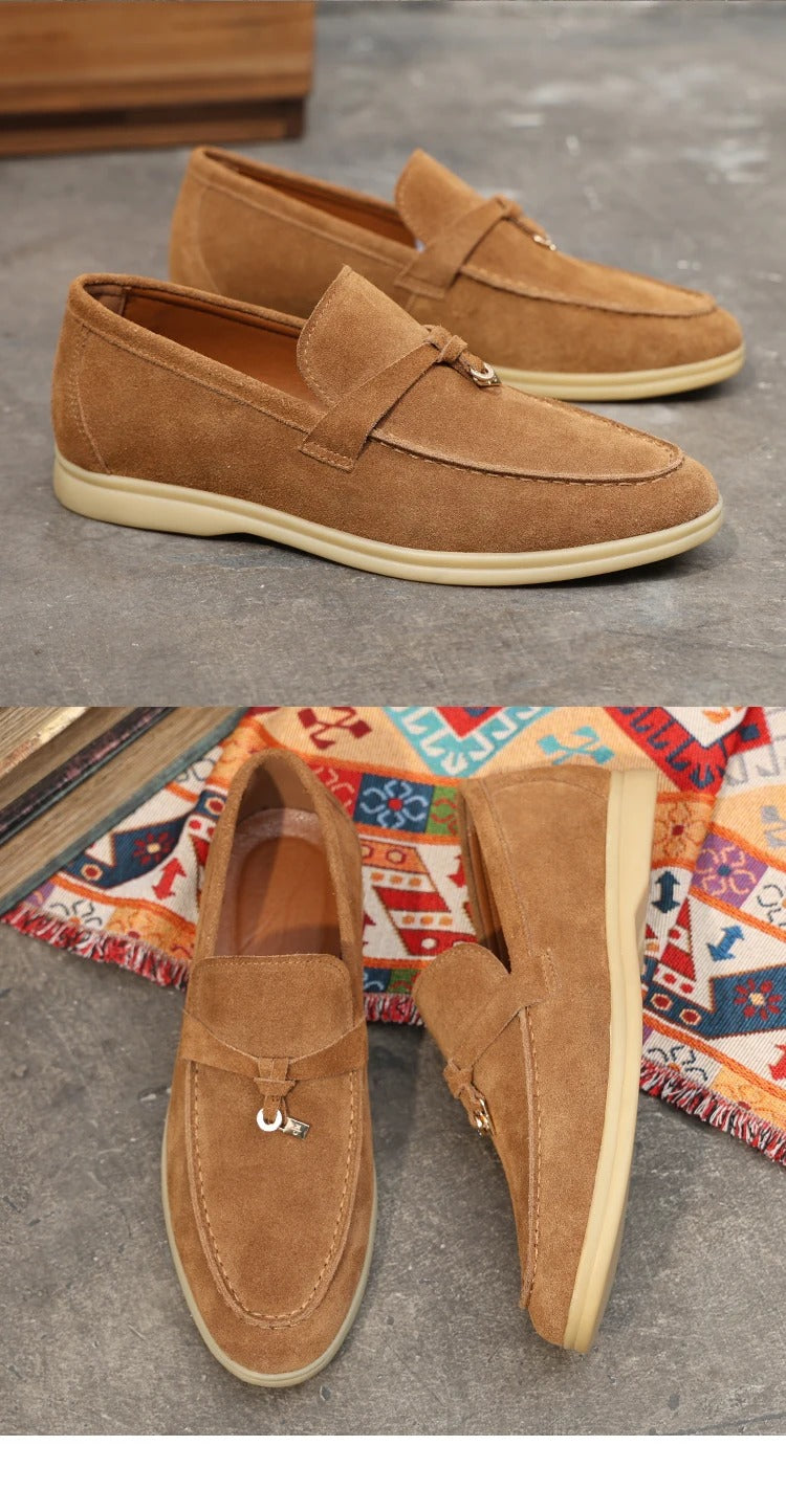 Tan suede Intrigante loafers with white soles and decorative metal hardware