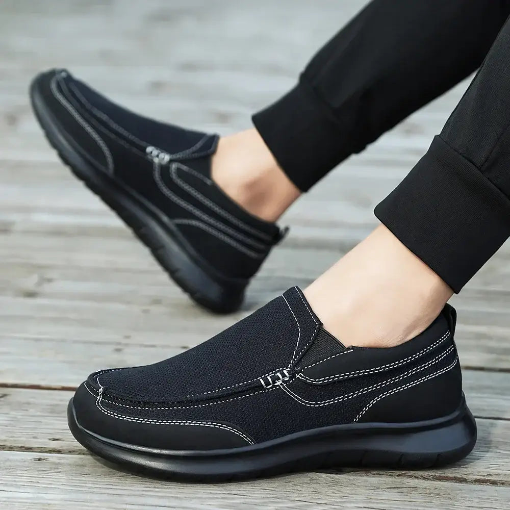 Muriel erkek günlük ayakkabı, kontrast dikişli siyah slip-on spor sneaker